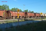 4 tarped ballast cars roll south to B'ville on 484 